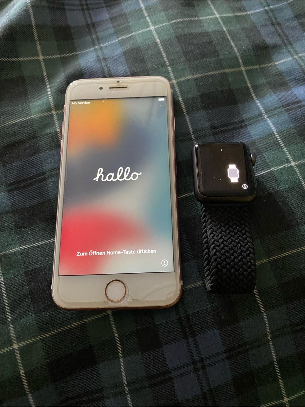 Apple iPhone (Rose Gold) with Apple Watch